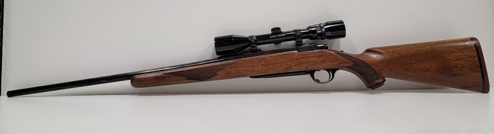 RUGER M77 BLUED 30-06 W/ BUSHNELL SCOPE