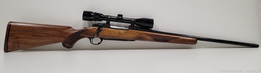 RUGER M77 BLUED 30-06 W/ BUSHNELL SCOPE